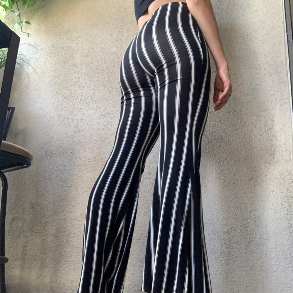 \\SOLD// Forever 21 Black and White Striped Bell Bottom Leggings Size Medium